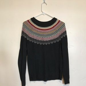 Black sweater with colorful neckline